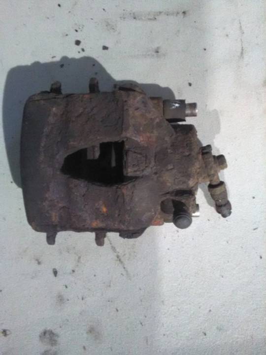 Levý přední brzdový třmen - ŠKODA - Octavia liftback 5DV.